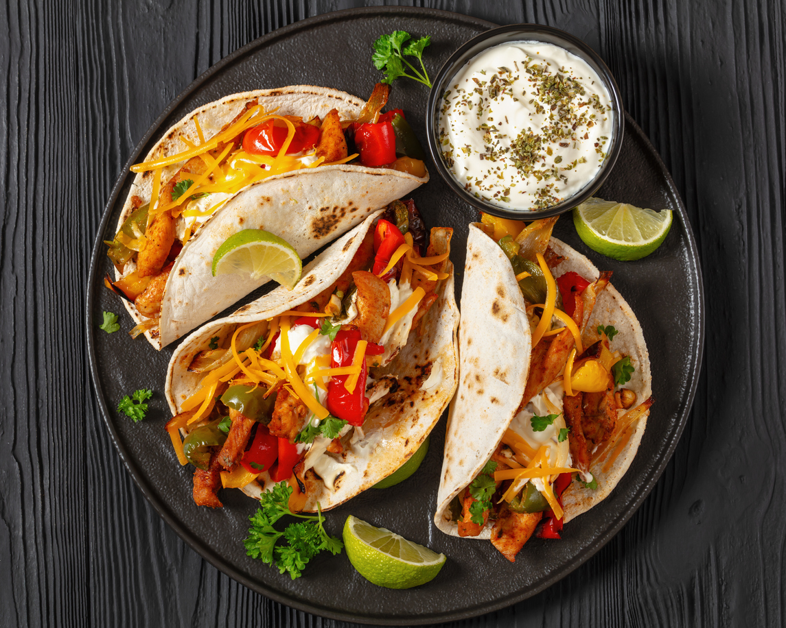 Baked tex-mex chicken fajitas on a plate