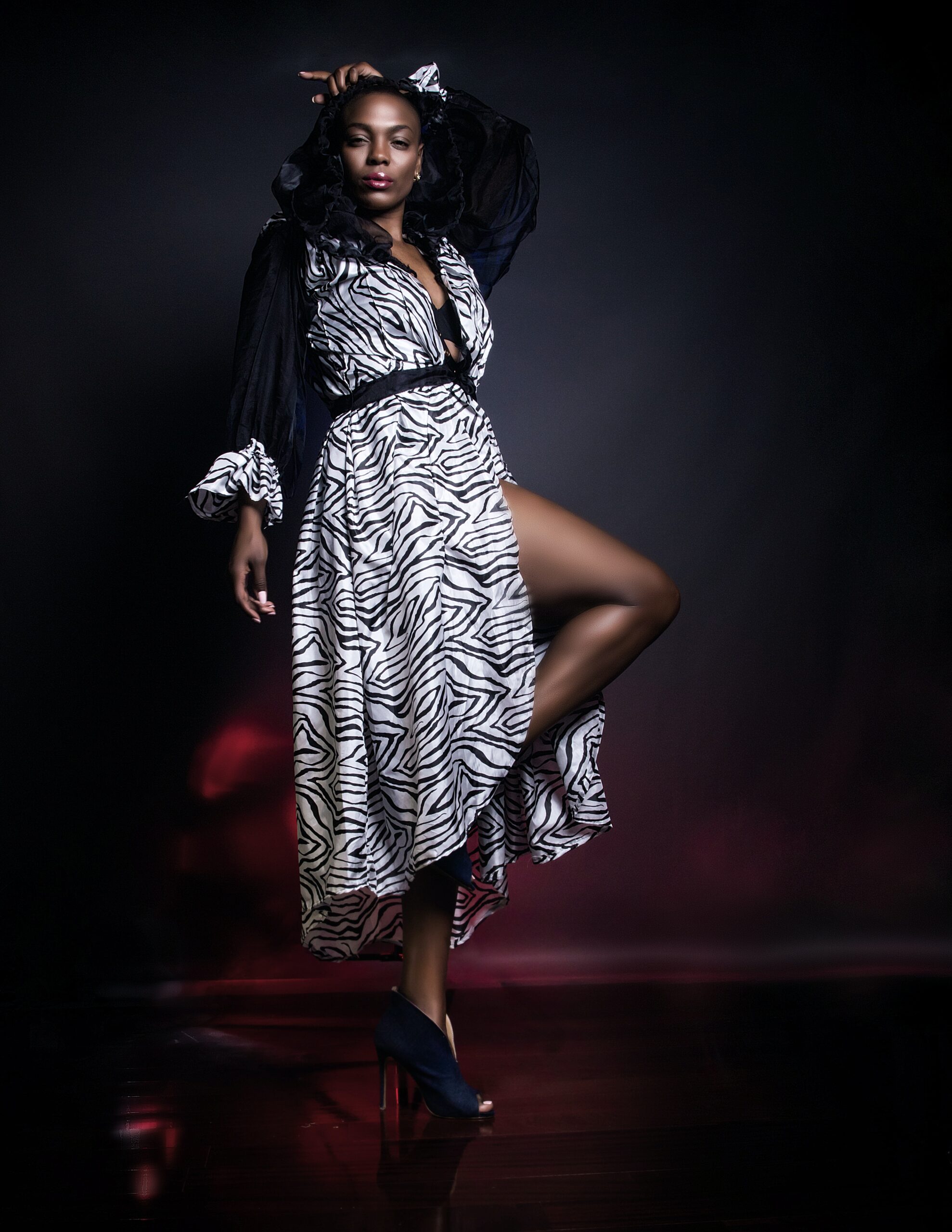 A woman wearing a black dress