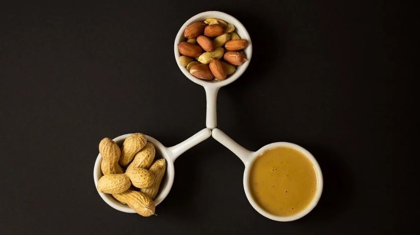 peanuts and nut butter in different con