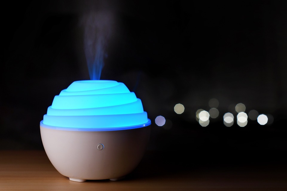 a diffuser diffusing essential oils for aromatherapy