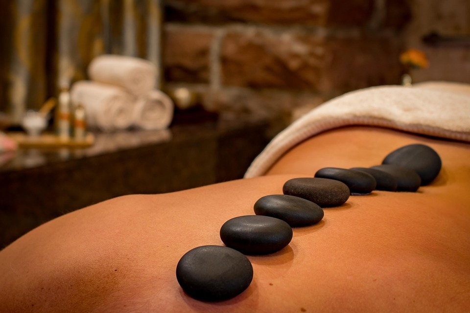 a hot stone massage session in progress