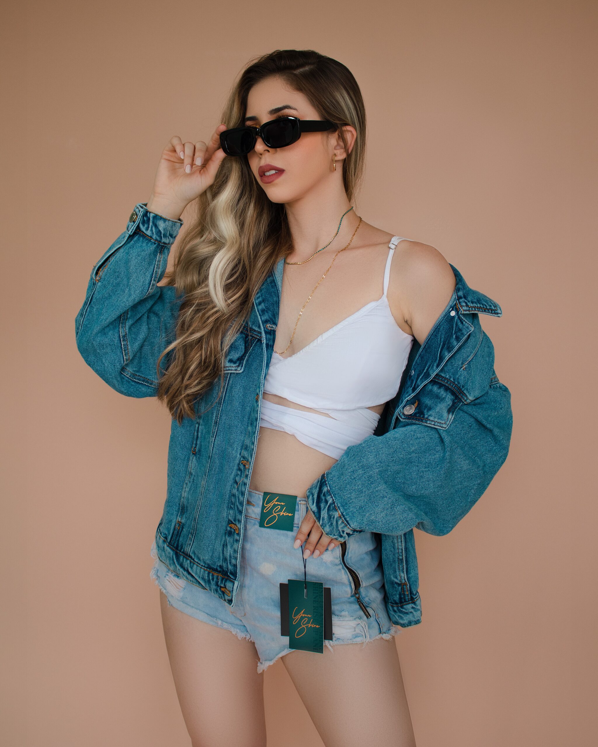 A woman wearing a sexy streetwear outfit