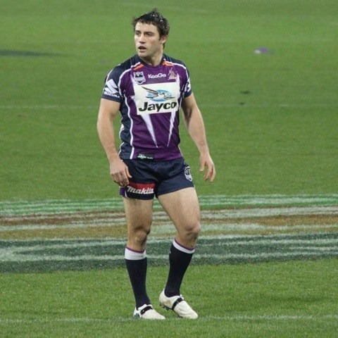 Cooper playing for Melbourne
