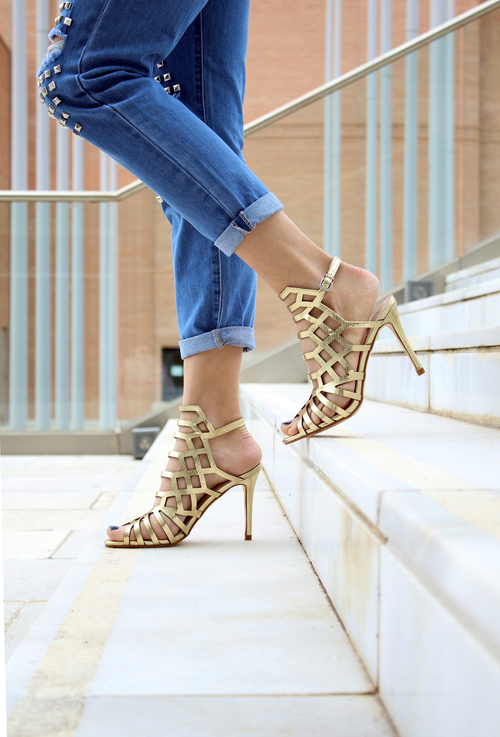 Woman wearing jeans and high heels
