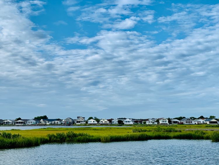 Houses next to a body of water in Ocean City, Maryland
